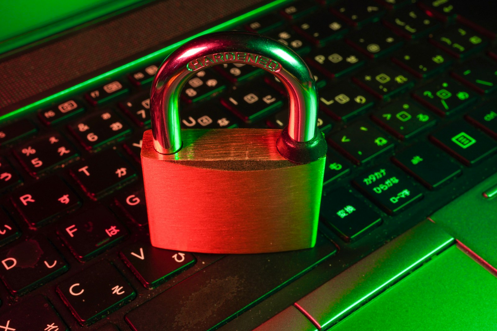 Red padlock on a black computer keyboard, illustrating hacked WordPress site recovery
