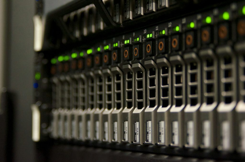 Server rack with blinking green lights, illustrating WordPress database optimization services